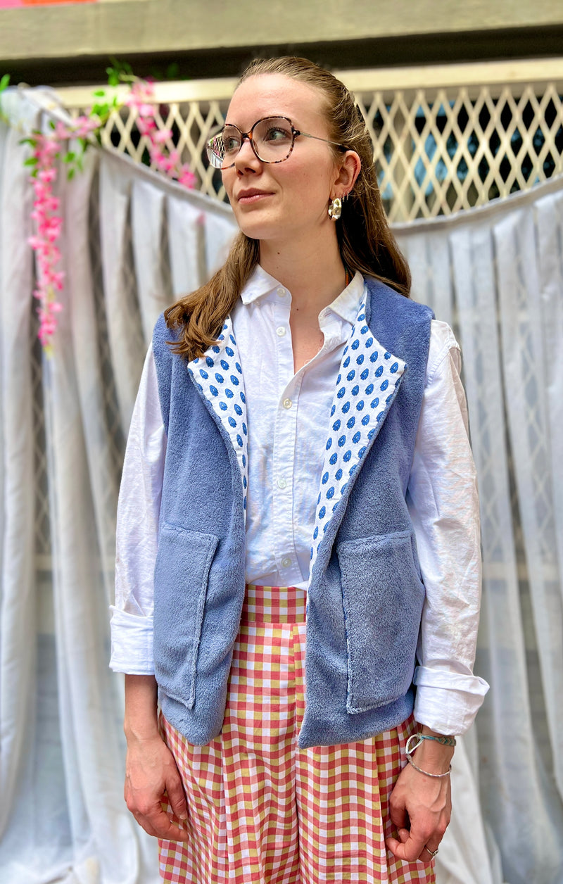 Blue reversible sleeveless vest