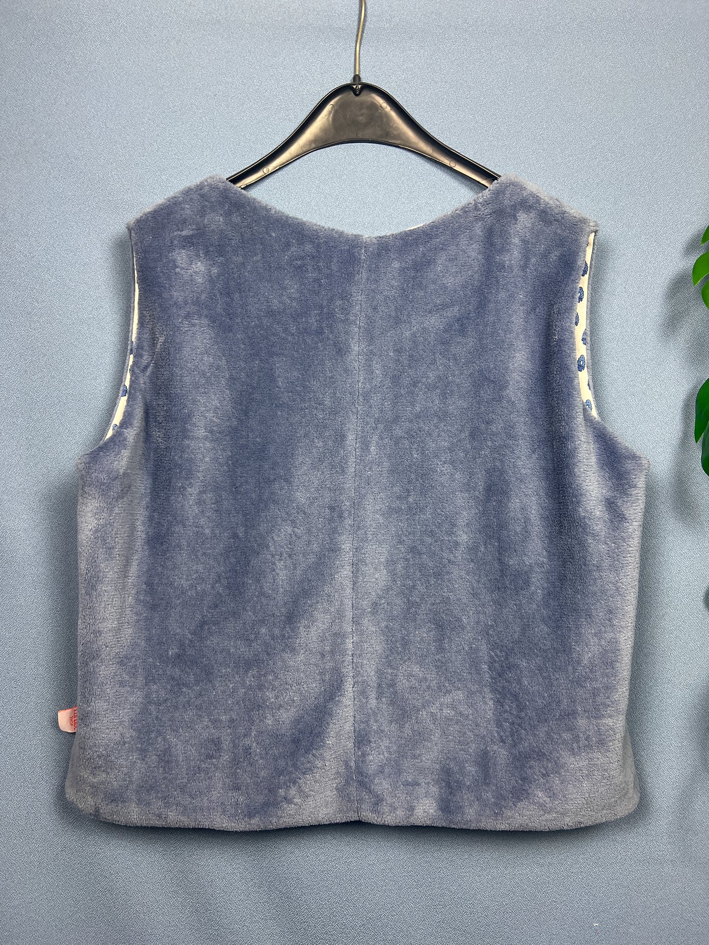 Blue reversible sleeveless vest