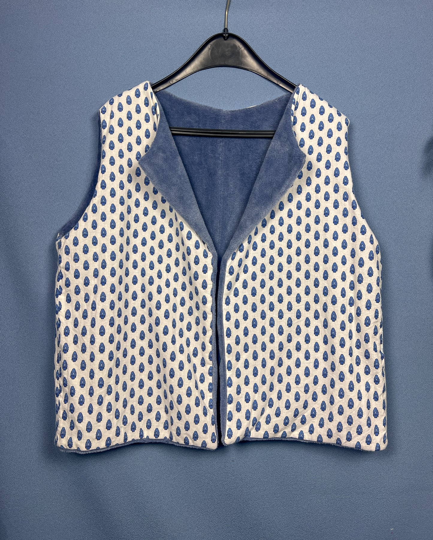 Blue reversible sleeveless vest