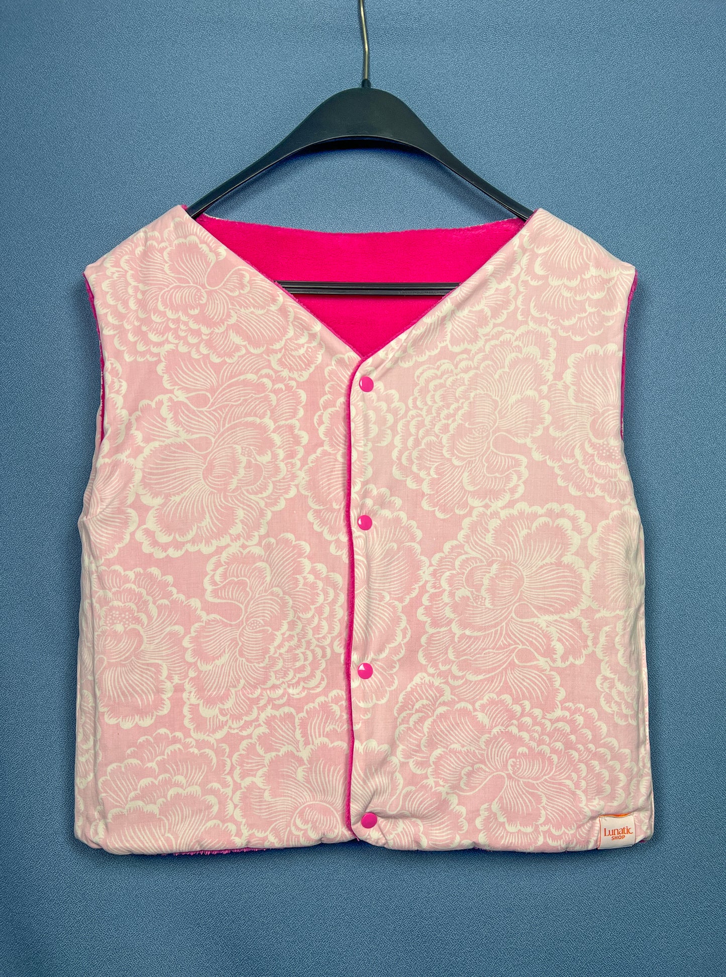 Pink reversible sleeveless vest