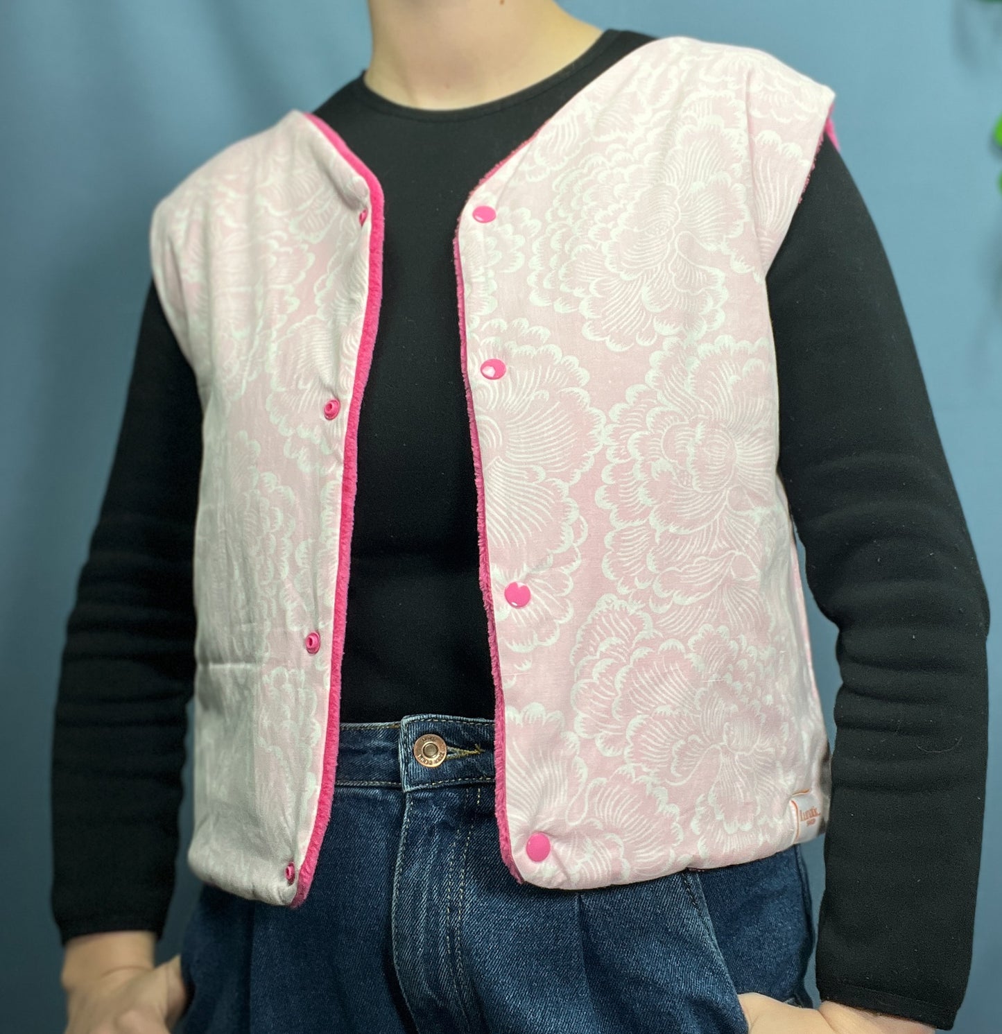 Pink reversible sleeveless vest