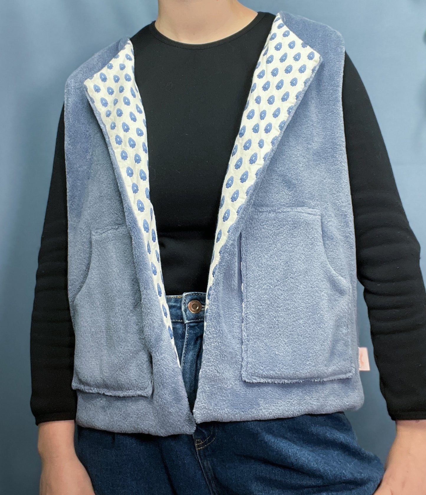 Blue reversible sleeveless vest