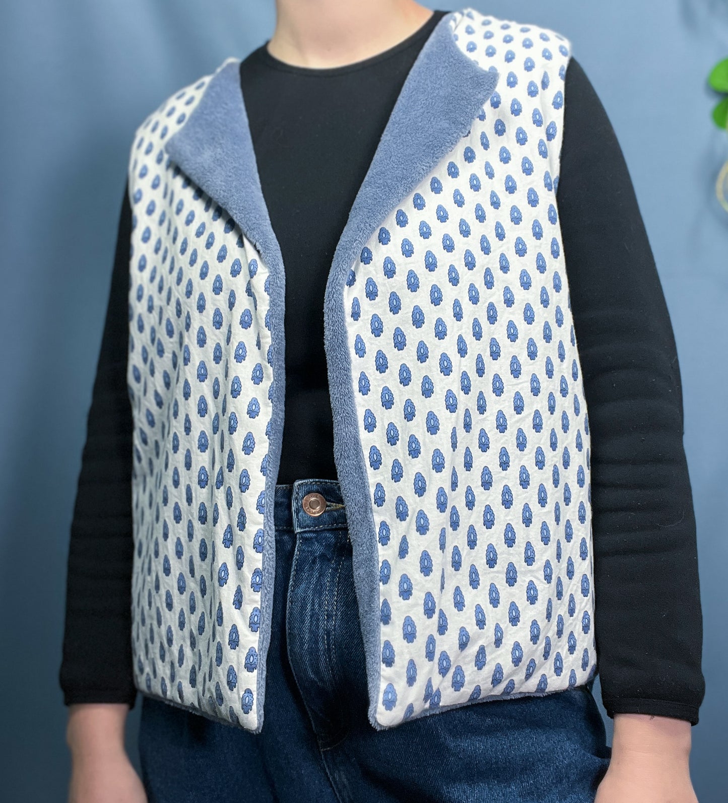 Blue reversible sleeveless vest